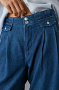 Load image into Gallery viewer, Pilcro Mid-Rise Pleated Trouser Jeans