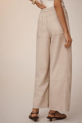 Load image into Gallery viewer, The Izzie Relaxed Pull-On Barrel Trousers by Pilcro: Faux Leather Edition