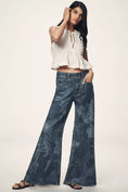 Load image into Gallery viewer, The Adi Mid-Rise Frayed Relaxed Flare Jeans by Pilcro: Patterned Edition
