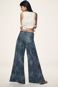 Load image into Gallery viewer, The Adi Mid-Rise Frayed Relaxed Flare Jeans by Pilcro: Patterned Edition
