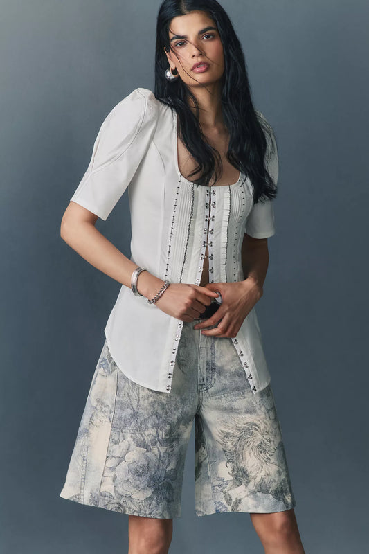 The Adi Mid-Rise Relaxed Bermuda Shorts by Pilcro