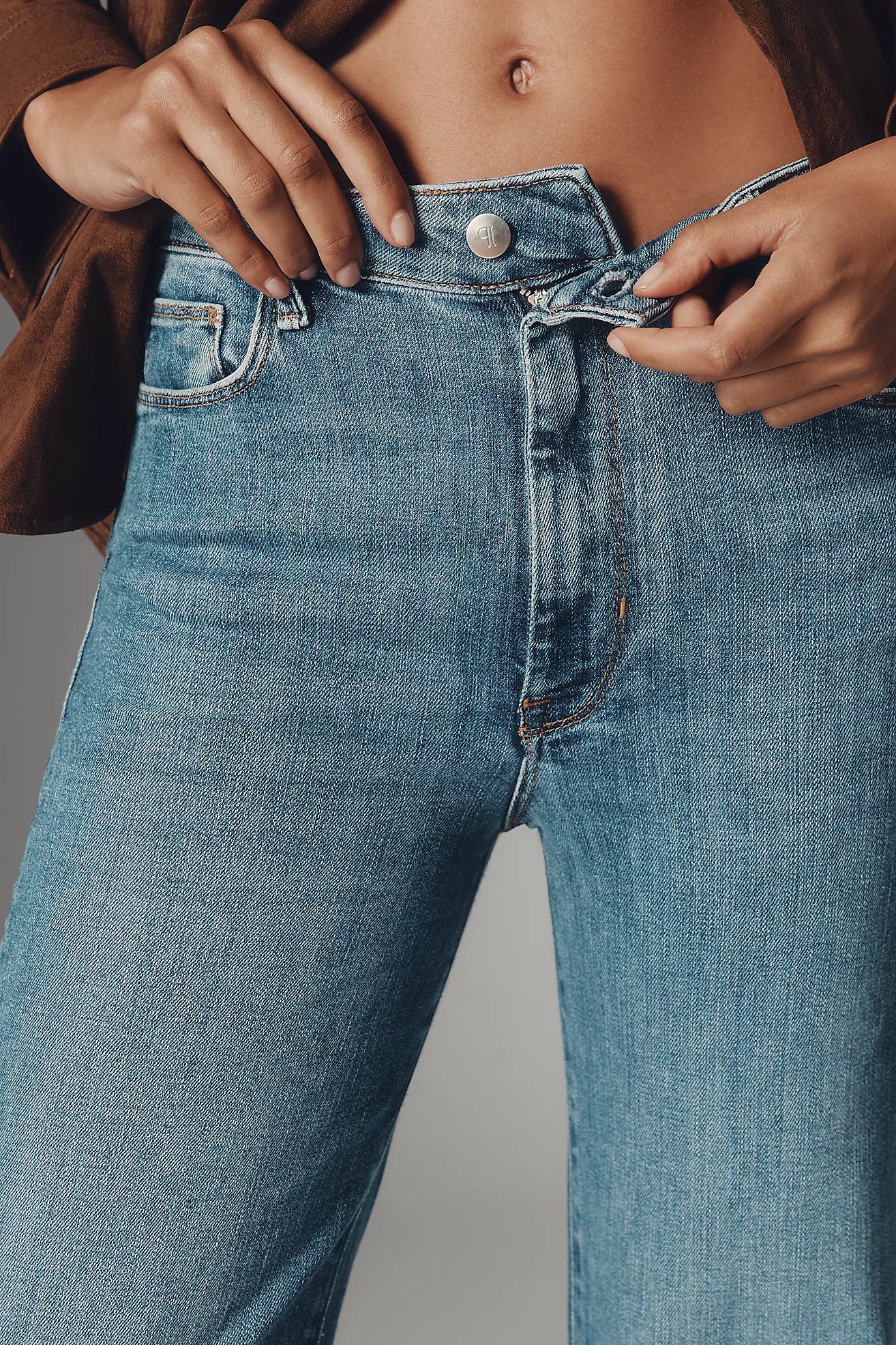 The Robbie High-Rise Flared Fray Jeans