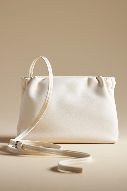 By Anthropologie Cinched Faux-Leather Clutch