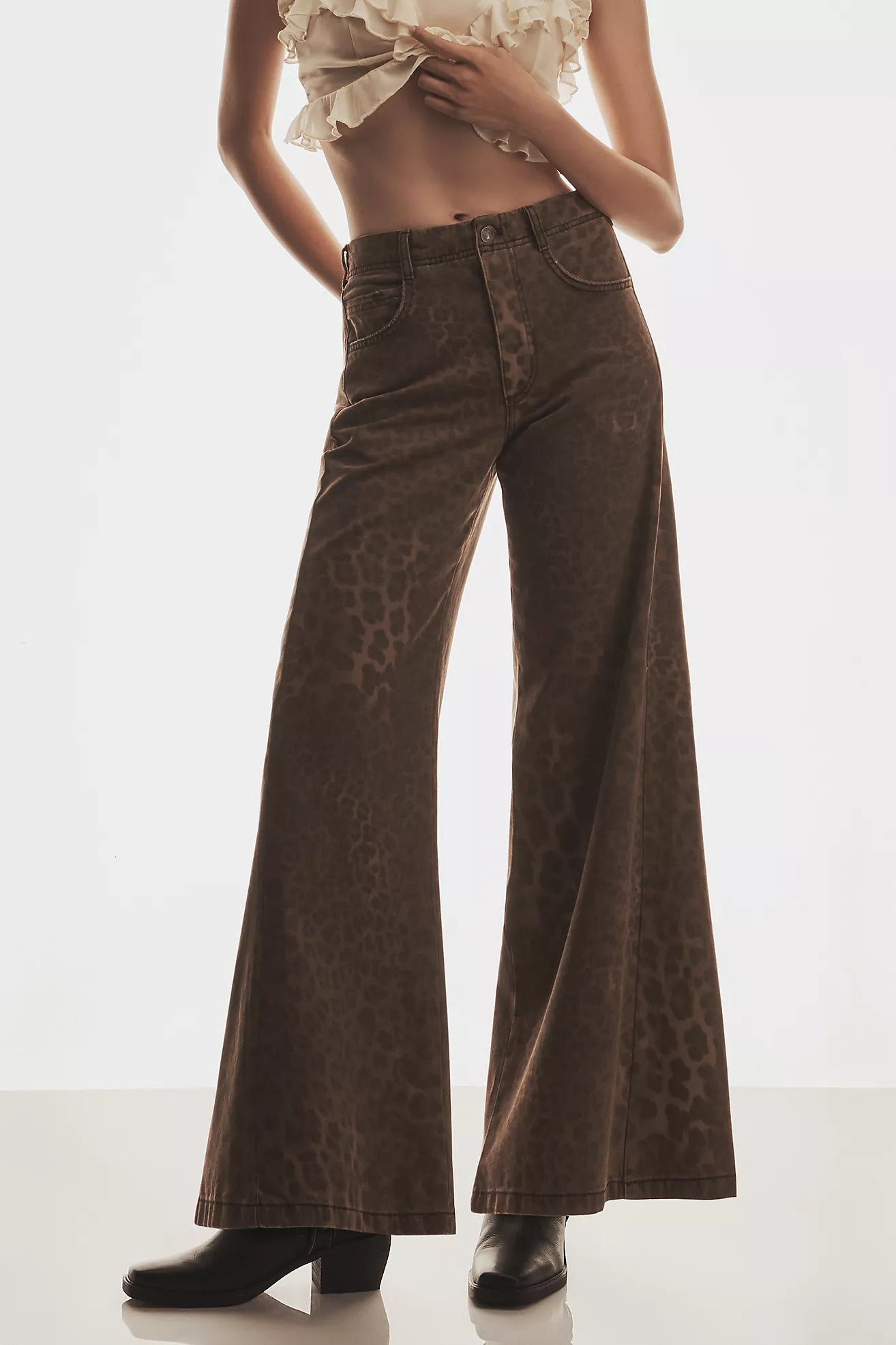 The Adi Leopard Mid-Rise Flare Jeans by Pilcro