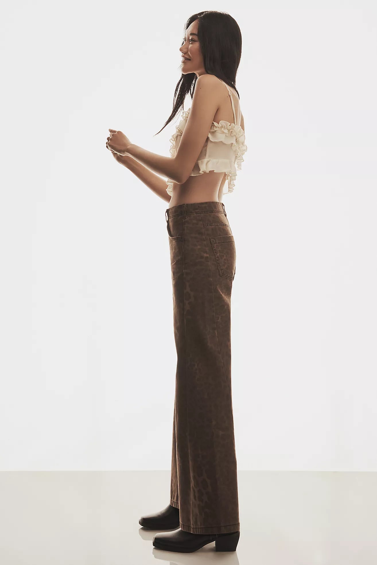 The Adi Leopard Mid-Rise Flare Jeans by Pilcro