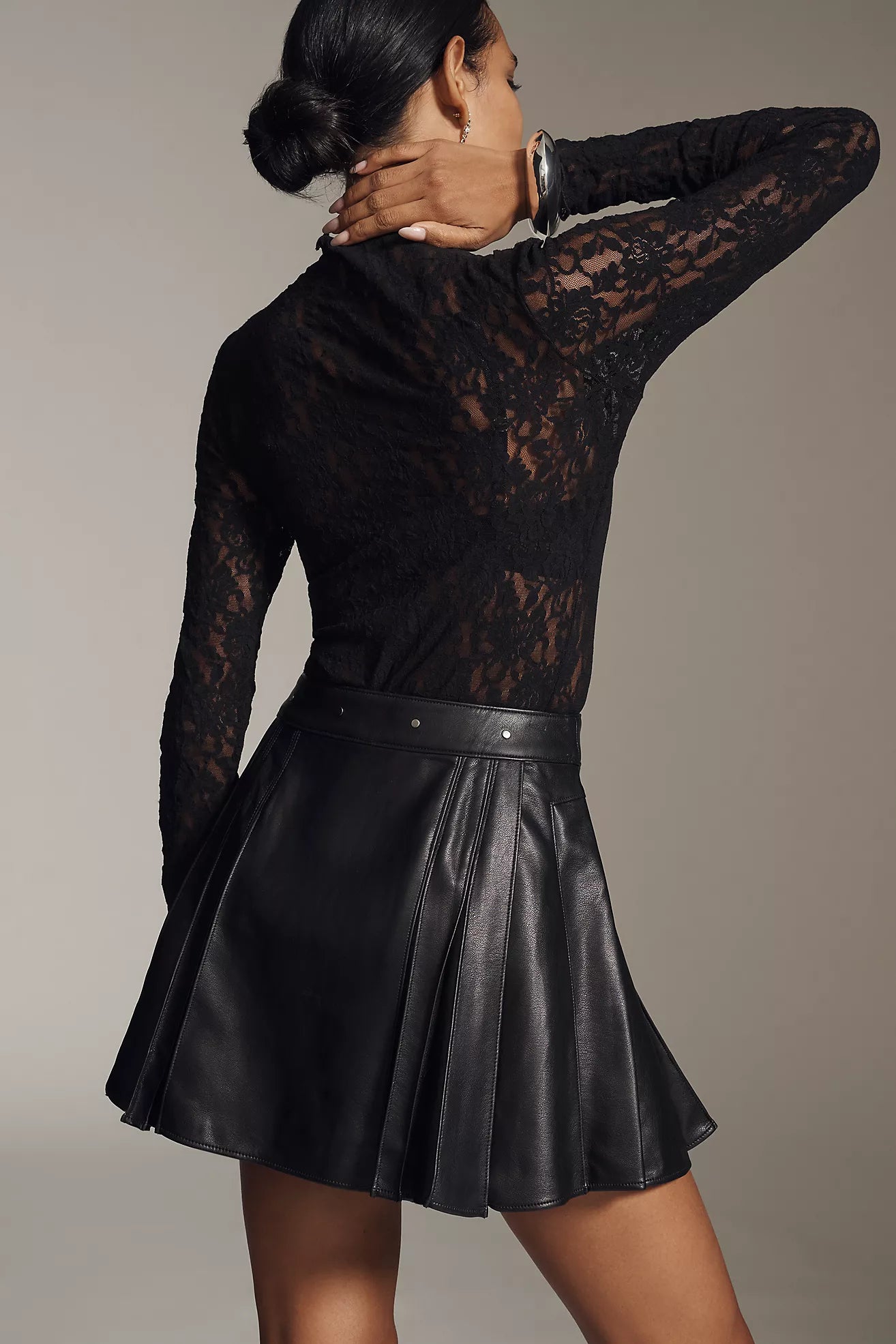 By Anthropologie Faux Leather Pleated Hardware Mini Skirt